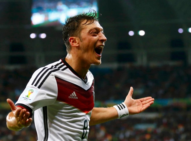 Germany's Mesut Ozil celebrates scoring their second goal during extra time in their 2014 World Cup round of 16 game against Algeria at the Beira Rio stadium in Porto Alegre June 30, 2014. REUTERS/Darren Staples (BRAZIL - Tags: SOCCER SPORT WORLD CUP TPX IMAGES OF THE DAY) ORG XMIT: GK175